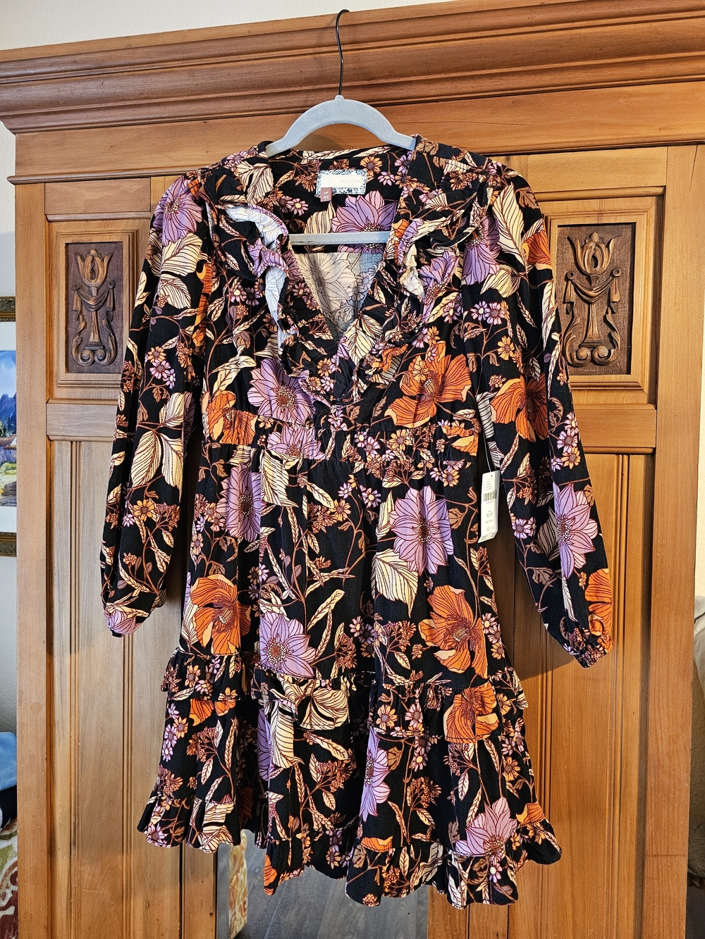 Floral Ruffle V‑Neck Mini Dress in Black, Orange & Lavender